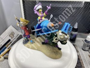 a group of toy figurines on a sink 3DPrintCustomz Custom 3D Print Painting
