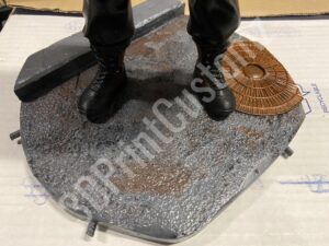 a persons legs in boots and boots on a metal surface 3DPrintCustomz Custom 3D Print Painting