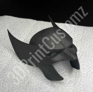 a black toy on a white surface 3DPrintCustomz Custom 3D Resin Printing