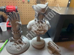 a couple of clay figurines 3DPrintCustomz Custom 3D Resin Printing