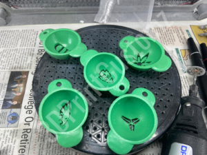 a group of green and white objects 3DPrintCustomz Custom 3D Resin Printing