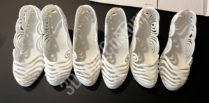 a group of white shoes 3DPrintCustomz Custom 3D Resin Printing