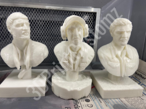 a group of white statues 3DPrintCustomz Custom 3D Resin Printing