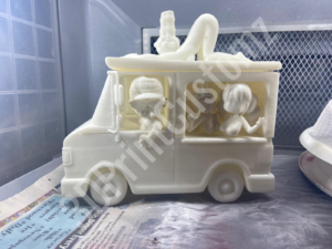 a toy car with a couple of people in it 3DPrintCustomz Custom 3D Resin Printing
