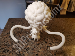 a white skull on a counter 3DPrintCustomz Custom 3D Resin Printing