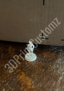a white statue on a table 3DPrintCustomz Custom 3D Resin Printing