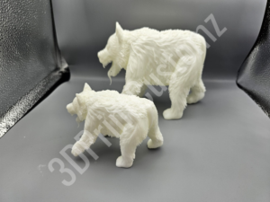 a small white cat figurine 3DPrintCustomz Custom 3D Resin Printing