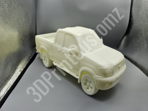 a toy car on a table 3DPrintCustomz Custom 3D Resin Printing