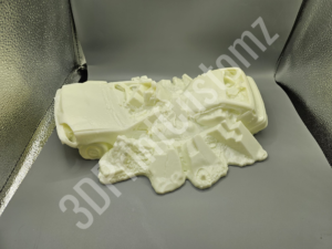 a white tissue paper on a black surface 3DPrintCustomz Custom 3D Resin Printing